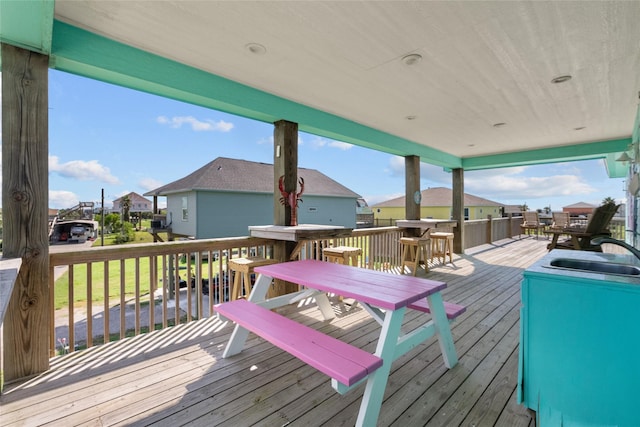 wooden deck featuring sink