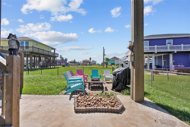 view of patio / terrace featuring an outdoor fire pit