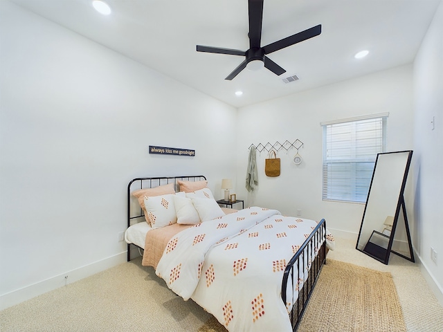 carpeted bedroom with ceiling fan