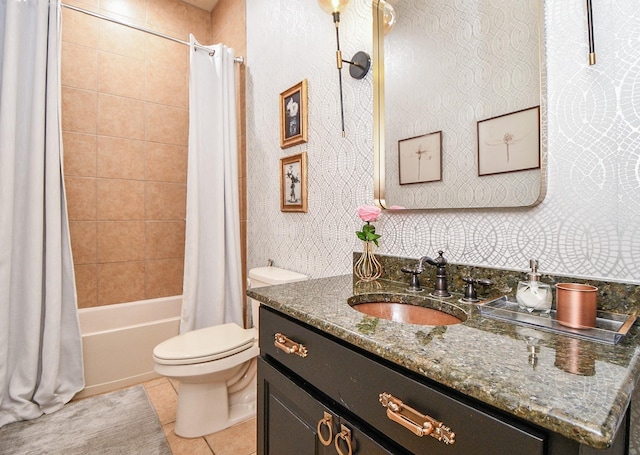 full bathroom featuring tile patterned floors, toilet, shower / tub combo, and vanity