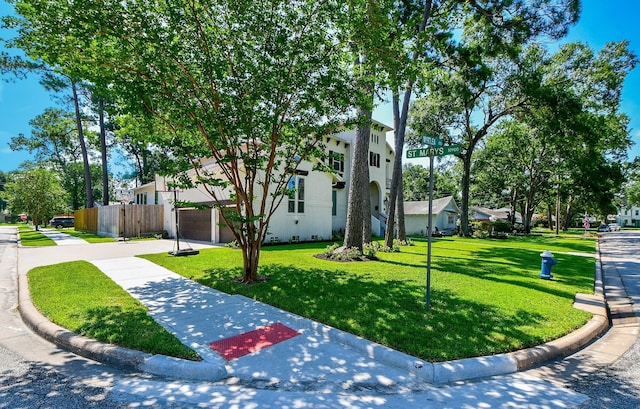 view of community with a lawn