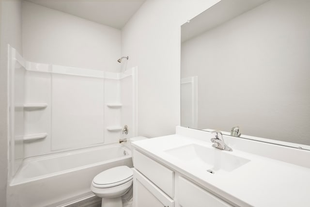 full bathroom with hardwood / wood-style floors, vanity, toilet, and washtub / shower combination