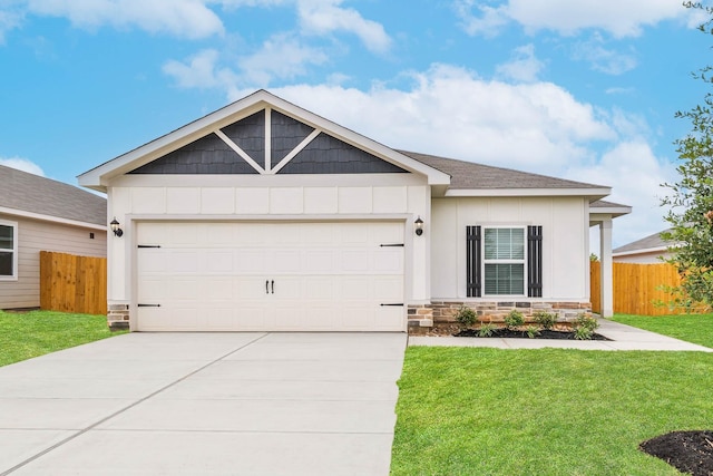 view of front of house with a front lawn and a garage