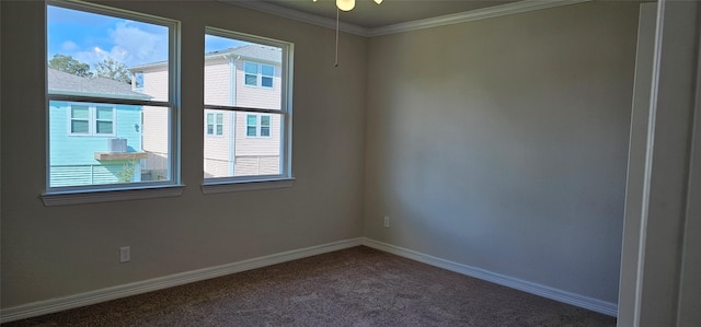 unfurnished room with carpet floors, ceiling fan, and crown molding