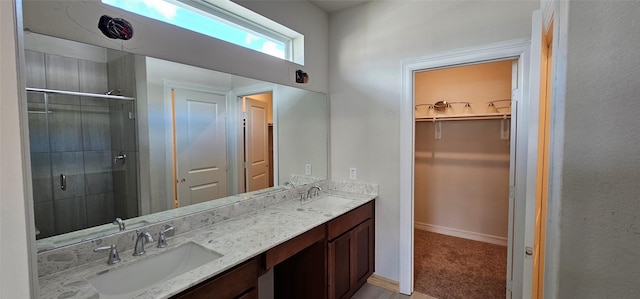 bathroom with vanity and walk in shower