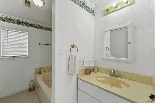 bathroom with vanity, a tub to relax in, and crown molding