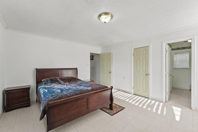 bedroom featuring crown molding