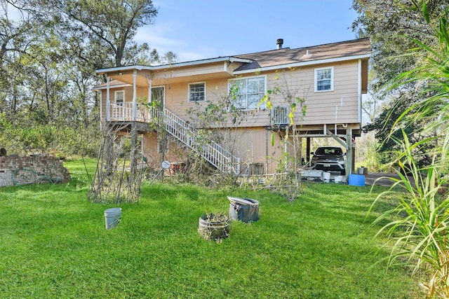 rear view of house with a carport