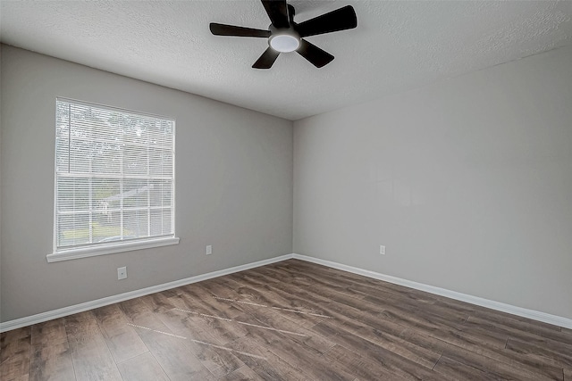 spare room with ceiling fan, a textured ceiling, and hardwood / wood-style flooring