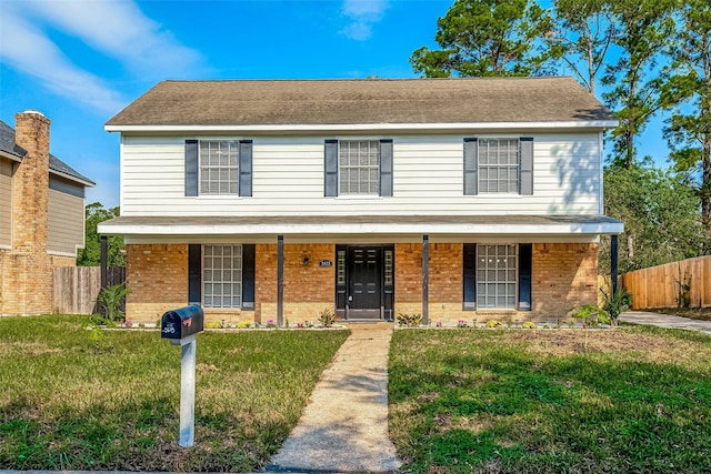 view of front facade featuring a front lawn