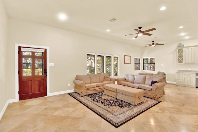 living room featuring ceiling fan