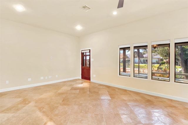 spare room featuring ceiling fan