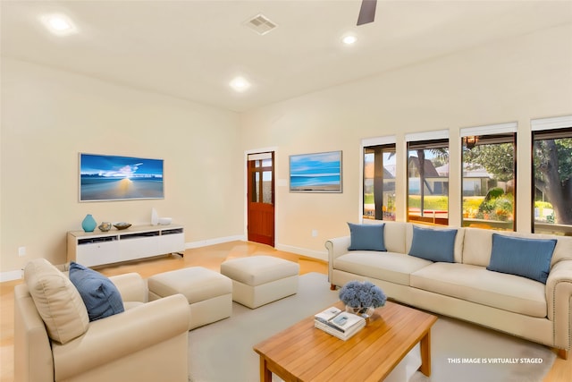 living room with ceiling fan