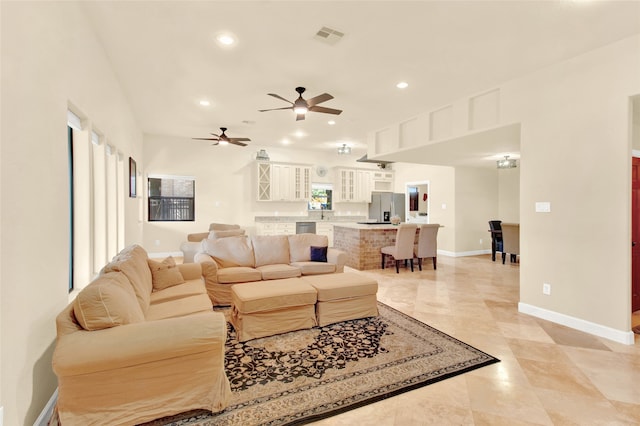 living room featuring ceiling fan