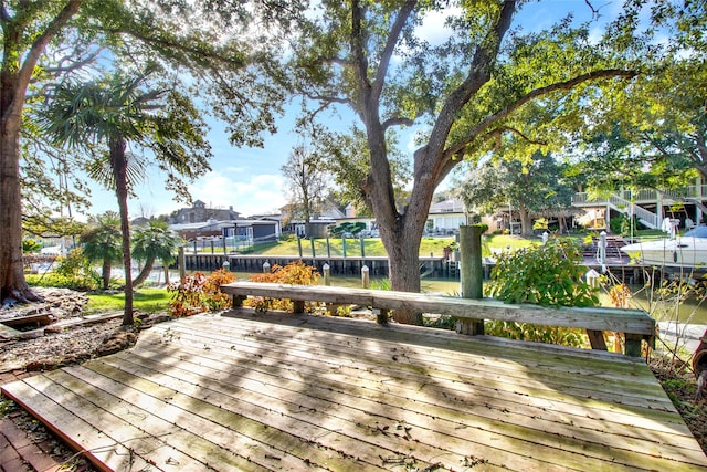 wooden deck with a water view