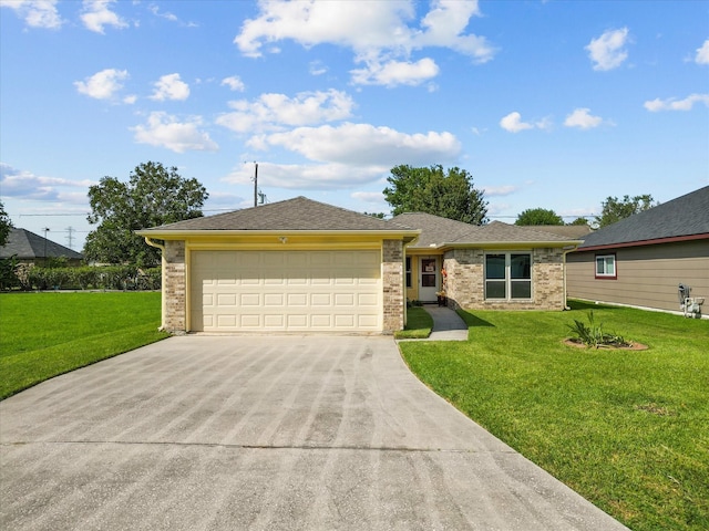 ranch-style home featuring a garage and a front lawn