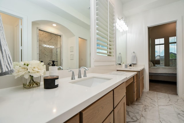 bathroom with vanity and walk in shower