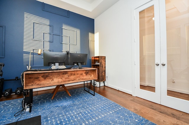 office featuring french doors and hardwood / wood-style floors