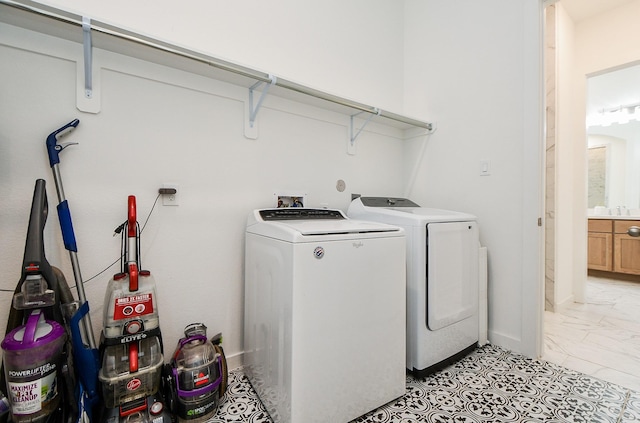 laundry room with washer and dryer