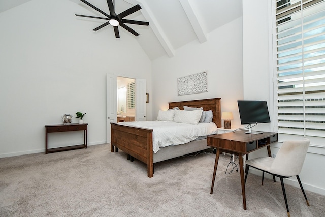 bedroom with light carpet, high vaulted ceiling, ensuite bath, ceiling fan, and beamed ceiling