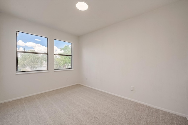 empty room featuring carpet floors