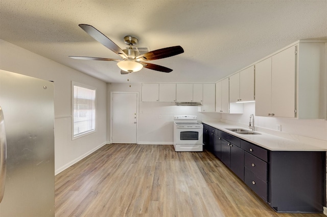 kitchen featuring sink, white cabinets, a textured ceiling, and white electric range