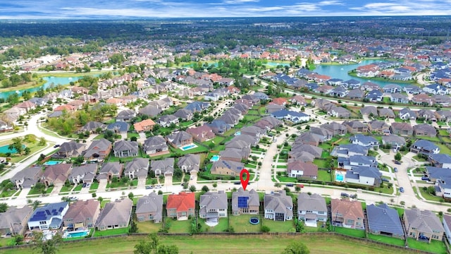 drone / aerial view with a water view