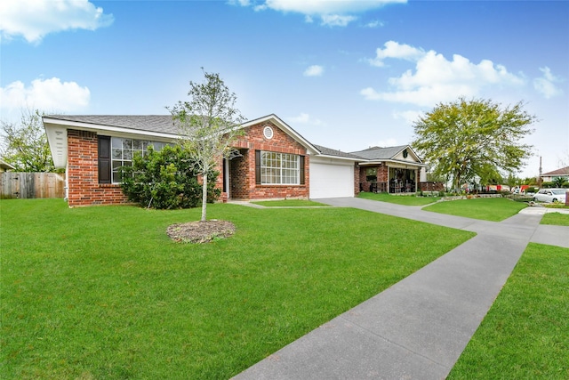 ranch-style house with a front yard and a garage