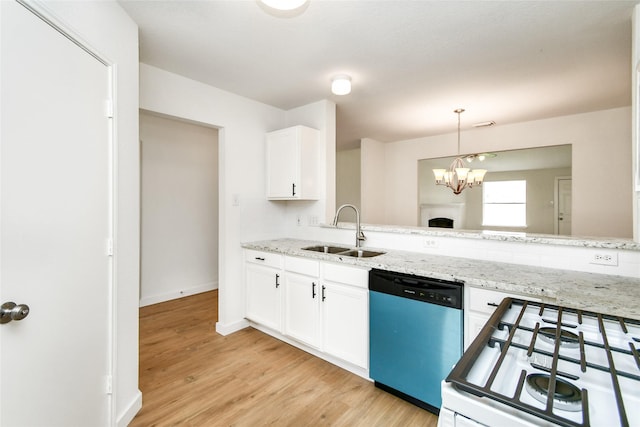 kitchen with white cabinetry, dishwasher, sink, light stone counters, and range