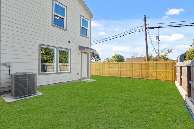 view of yard featuring central AC unit