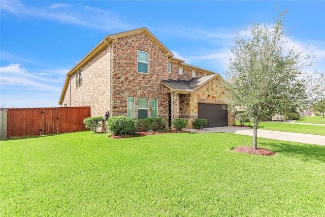 view of front of house featuring a garage and a front lawn