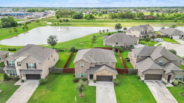 bird's eye view with a water view