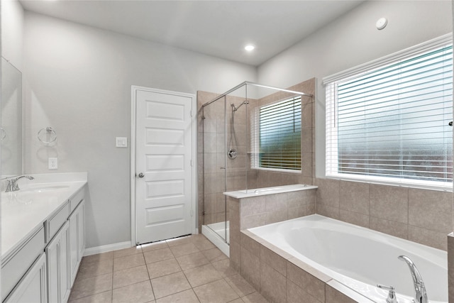 bathroom featuring vanity, tile patterned floors, and independent shower and bath