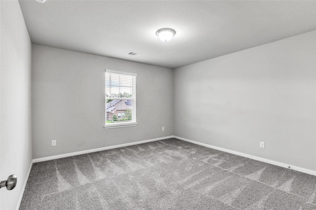 empty room with carpet floors