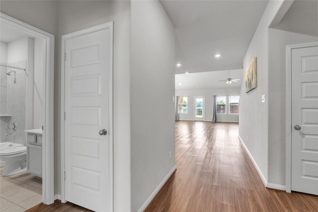 corridor featuring light wood-type flooring