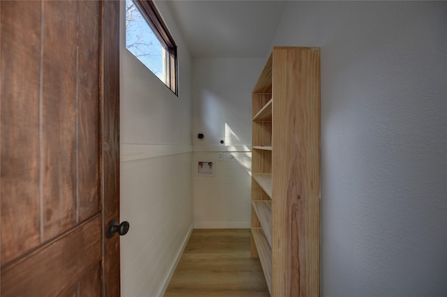 spacious closet featuring light hardwood / wood-style floors