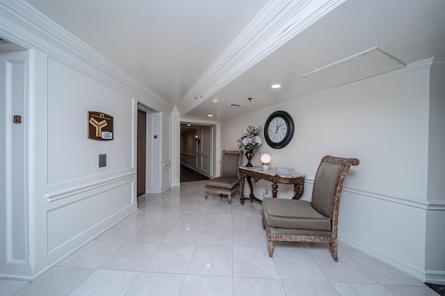 hall with light tile patterned floors and ornamental molding