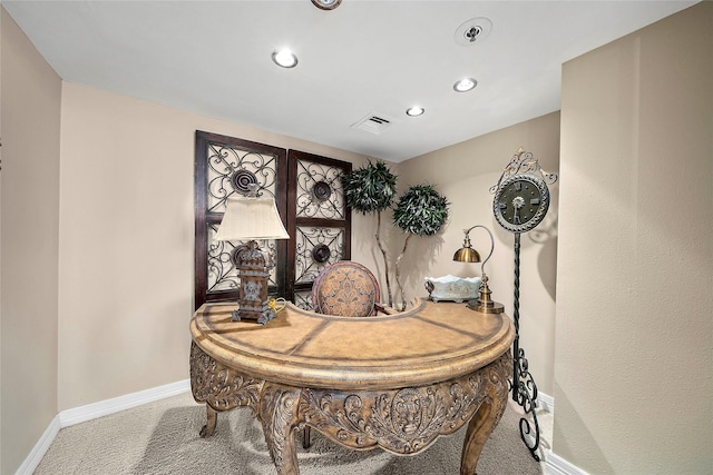 dining area featuring carpet