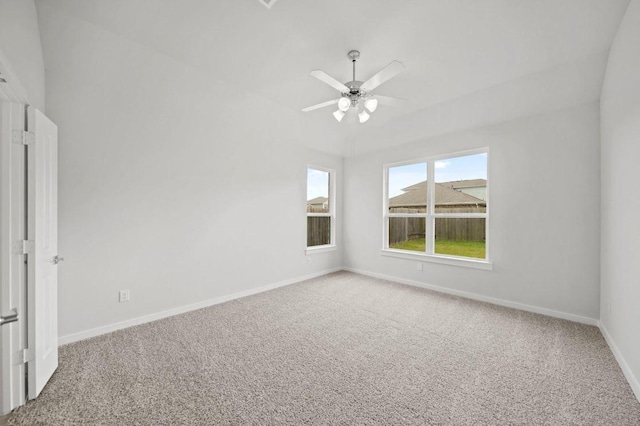 unfurnished room with ceiling fan and carpet floors