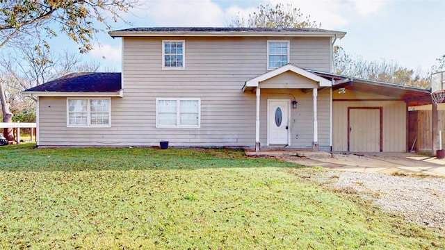 view of property featuring a front lawn