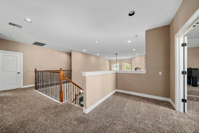 hallway featuring carpet floors