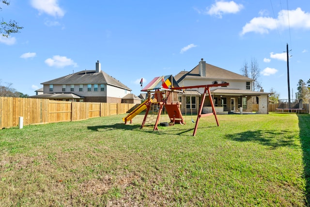 view of play area featuring a yard