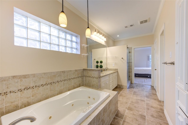 bathroom featuring tile patterned floors, a relaxing tiled tub, ornamental molding, and vanity