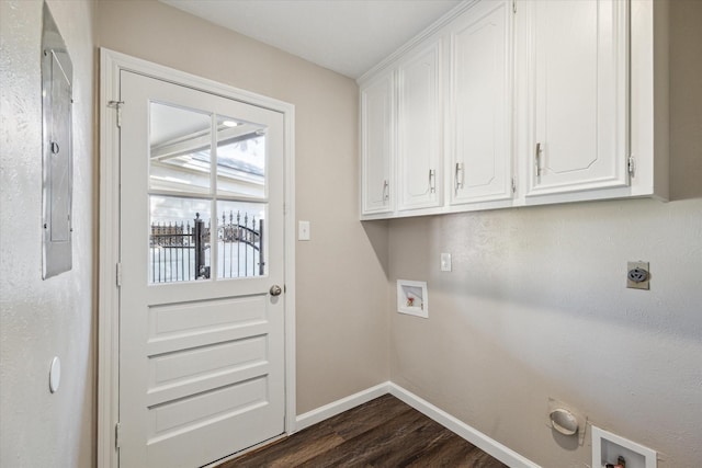 laundry area featuring cabinets, washer hookup, hookup for an electric dryer, dark hardwood / wood-style flooring, and electric panel