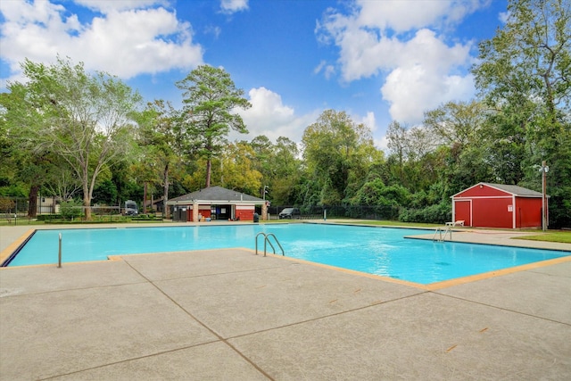 view of pool featuring a patio