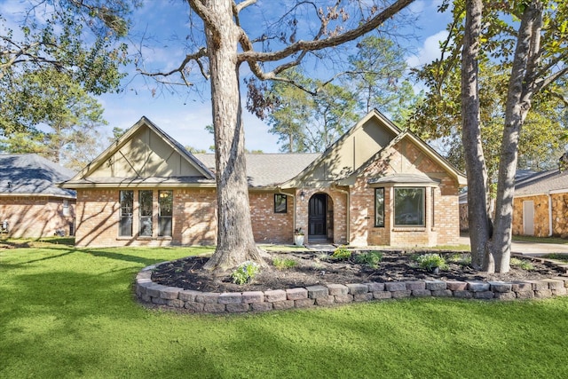 tudor-style house with a front lawn