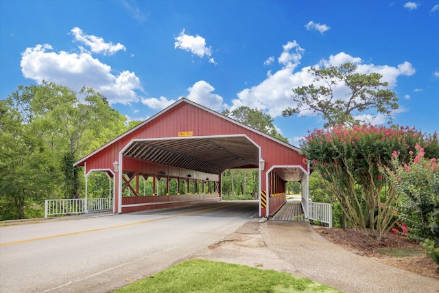 view of parking / parking lot with a carport