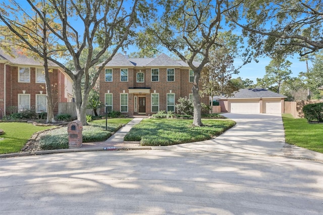 colonial inspired home with a garage