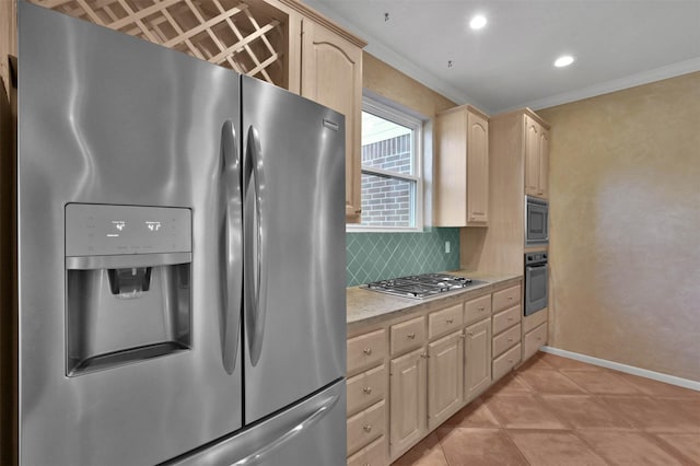 kitchen featuring light brown cabinets, stainless steel appliances, decorative backsplash, light tile patterned flooring, and ornamental molding