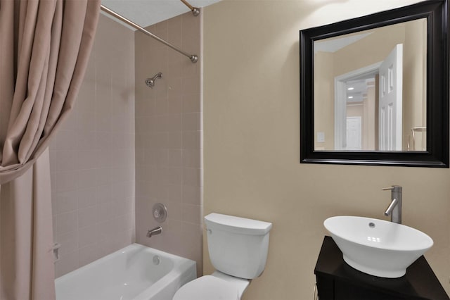 full bathroom featuring vanity, toilet, and shower / bath combo with shower curtain